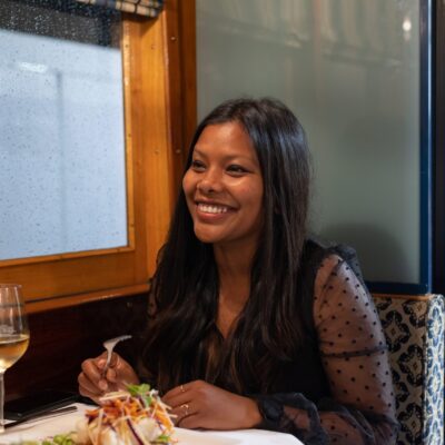 Woman dining on the Christchurch Tramway Restaurant - Best Restaurants Christchurch
